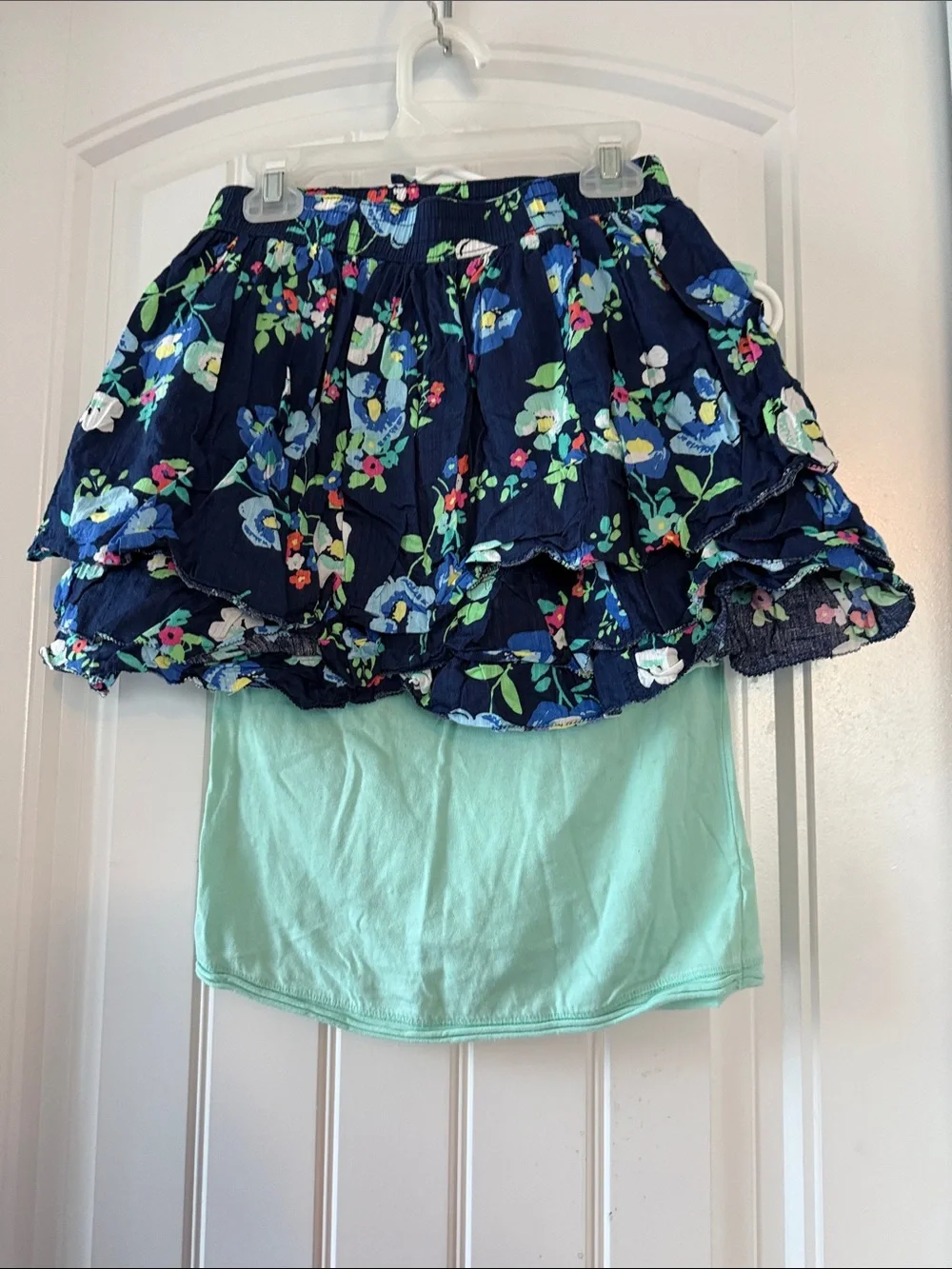 Gently worn Cherokee Mint Bunny Graphic Tee with Navy Floral Skirt Set